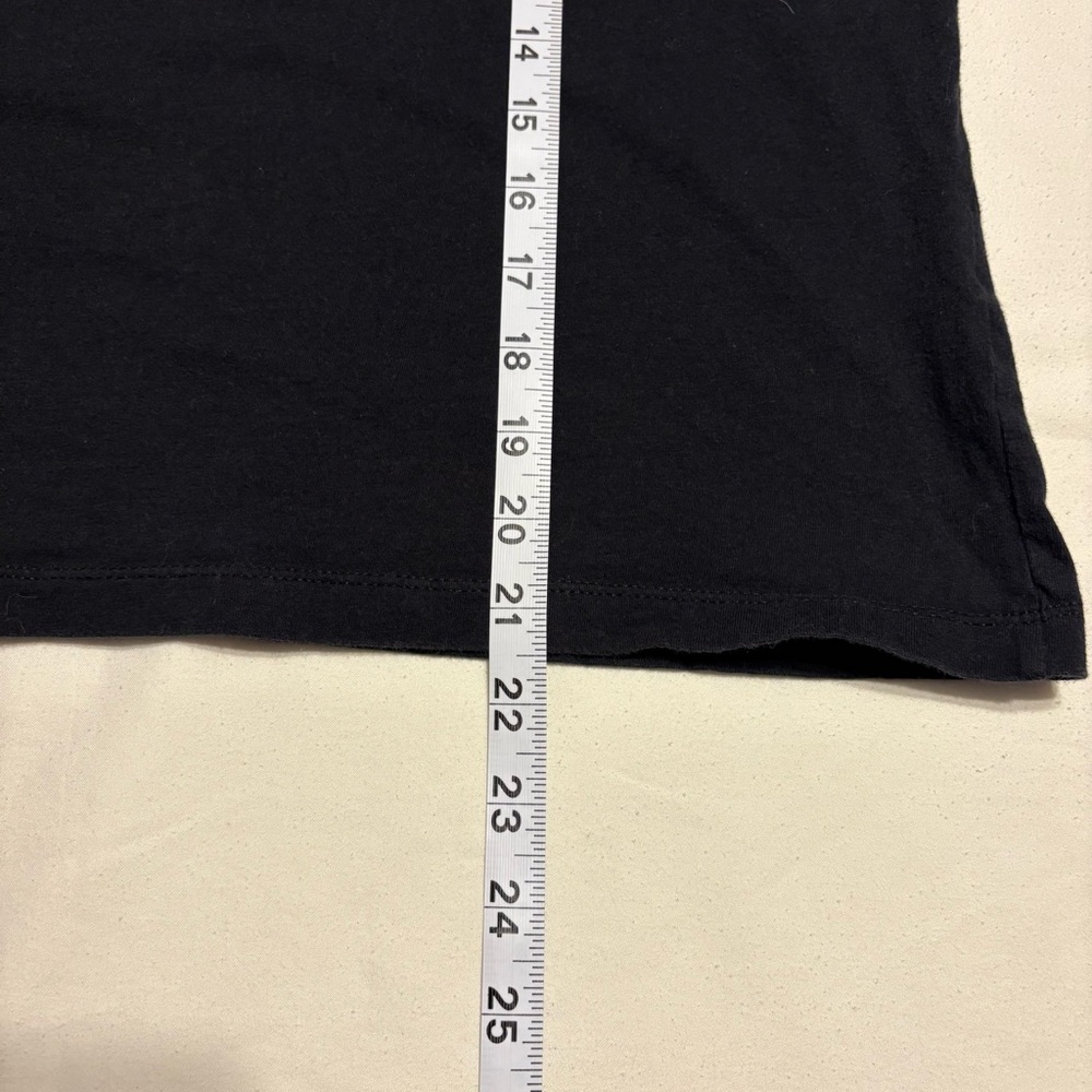 Black Nike T-shirt featuring an orange butterfly graphic logo - Picture 3 of 6